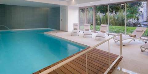 piscine-chauffee Parking couvert